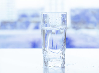 transparent glass of water with air bubbles