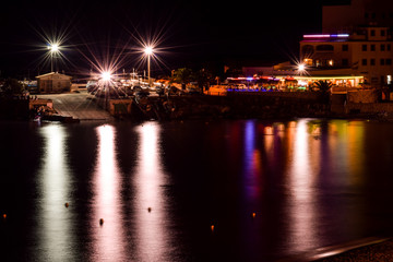 Fototapeta na wymiar restaurants in night in the harbour in Spain.