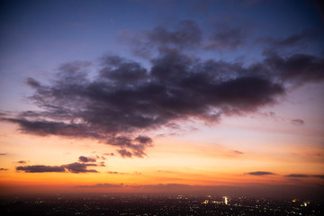 Colorful dawn / dusk sky with dark clouds
