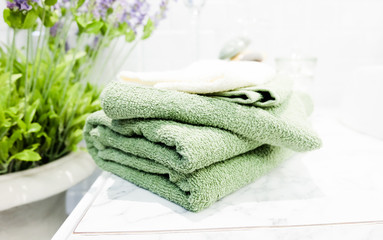 Fototapeta na wymiar Fresh clean bath towels in bathroom