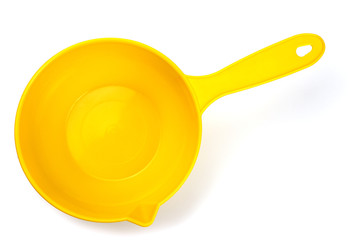 Yellow water scoop isolated on white background, top view