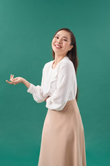 Asian woman with hand showing something