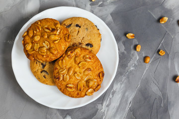 Tasty sweet cookies on a gray background