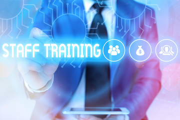 Word writing text Staff Training. Business photo showcasing program that helps employees learn specific knowledge