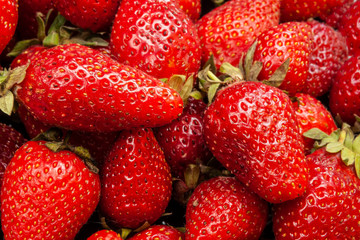 Close-up of fresh tasty strawberries. Ripe strawberry background