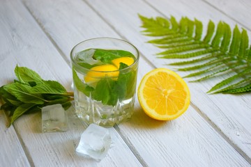 Summer refreshing lemon drink with peppermint