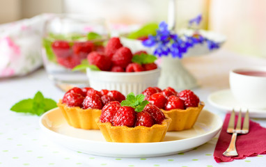 Fruit raspberry cakes on a table