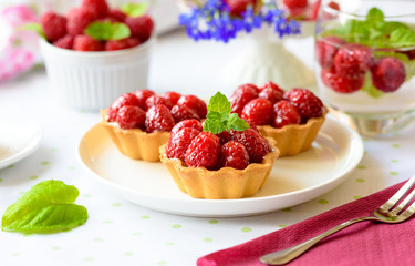 Fruit raspberry cakes on a table