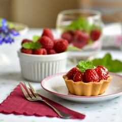 Fruit raspberry cakes on a table