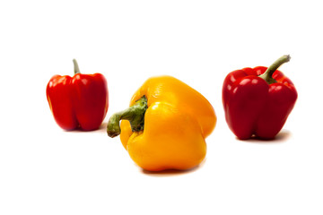 Composition of fresh harvest Bulgarian pepper on a white backround