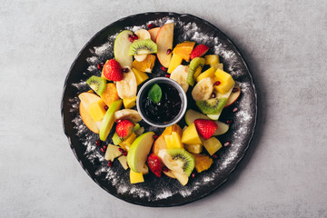 colorful fruit salad served on plate