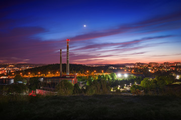 Fototapeta premium View from Stranska skala (Stránská skála in czech language) - the area of the incinerator of the city of Brno at dusk with Venus in the sky.