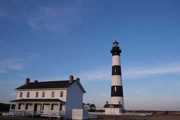 Bodie Island historic Lighthouse in the Cape Hatteras National Seashore at sunset, Outer Banks,...