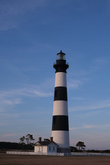 Bodie Island historic Lighthouse in the Cape Hatteras National Seashore at sunset, Outer Banks, North Carolina, USA