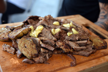 steak beef cooking fire grill bbq Entrecote on wood