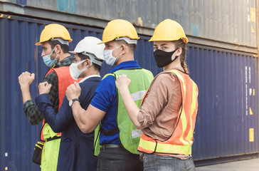 Engineering workders wearing masks before working