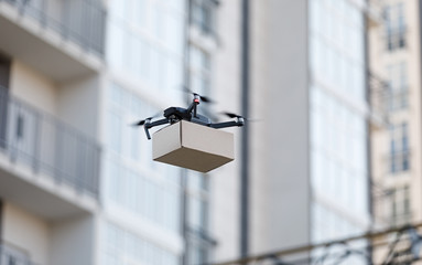 Drone for the transport of mail and parcels, blurred background