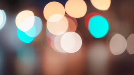 Abstract bokeh lights defocused on black background