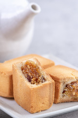 Pineapple cake pastry - Taiwanese famous sweet delicious dessert food with tea, close up, copy space design.