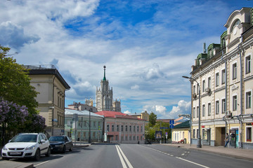 Fototapeta premium Yauzskaya street. View of the Stalinist skyscraper on Kotelnicheskaya embankment