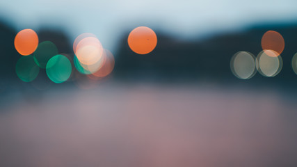 Abstract bokeh lights defocused on black background