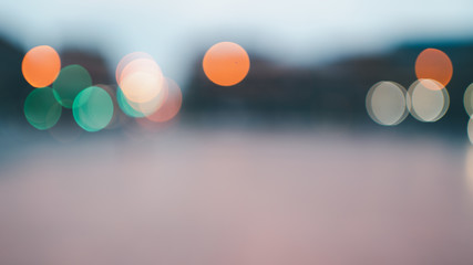 Abstract bokeh lights defocused on black background
