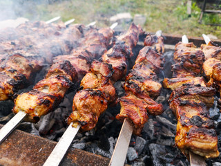 The meat on skewers is fried on charcoal