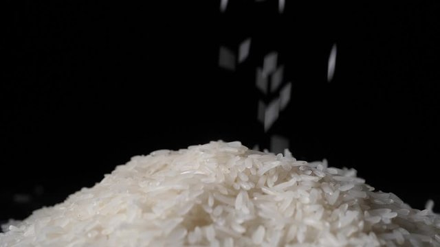 Chefs pour rice together to check the quantity and bring to cook according to the customer's order. camera locked shot.