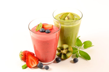 strawberry and kiwi smoothie in glass on white background