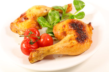 fried chicken leg with lettuce and tomato