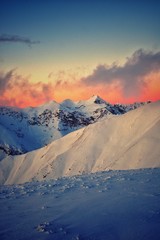 colorfully clouds at sunset in top of the mountain on winter time at high altitudes