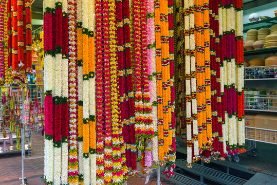 colorful necklace of flowers on a market stall in GeorgeTown