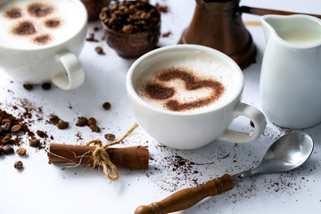 Pour latte art in a coffee cup