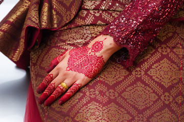 henna design on the hands of a bride in GeorgeTown, Malaysia