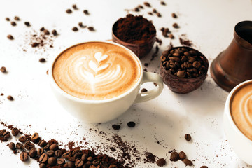 Latte art decorating a coffee cup