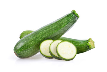 fresh green zucchini with slice on white background