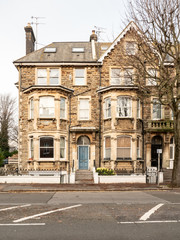 A traditional large Victorian terrace town house built from local stone in Hove, near Brighton, on the south east of England.