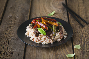 rice with beef and fried vegetables in soy sauce