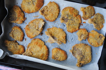 Pleurotus ostreatus dish: Crispy Breaded Oyster Mushrooms baked in the oven, in a black metal pan....