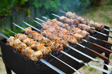 Russian style shashlik (kebab) prepared on charcoal smoke