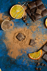 slice of dark chocolate in cocoa powder