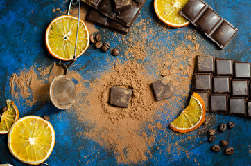 slice of dark chocolate in cocoa powder