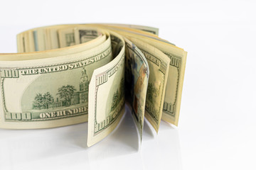 Banknotes on a white background. The concept of the global financial crisis. Suitable for puzzles...