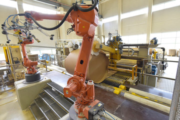 paper mill: production of paper rolls for the printing industry - paper rolls in a factory
