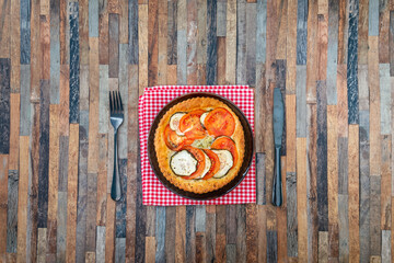 Obraz na płótnie Canvas Fine Tomato Zucchini Tarts Mozzarella, pesto and virgin olive oil