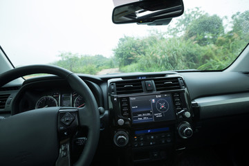 Off road car in the rainy nature