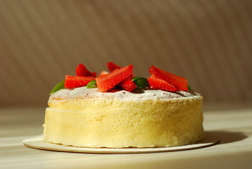 Japanese cheesecake with strawberries and basil