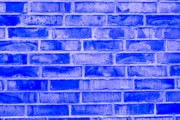 texture of blue brick wall close up , neon bricks background macro , bricklaying surface backdrop