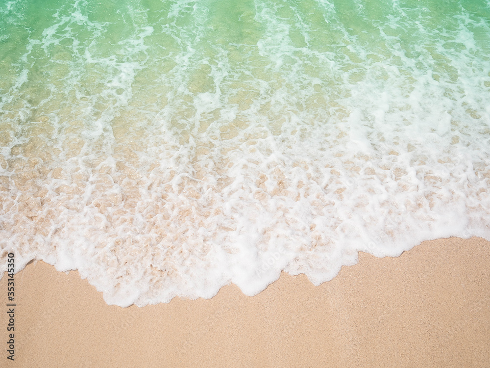 Wall mural beach top view.beach sand and blue sea in thailand. summer holiday travel concept.