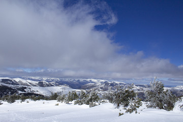 Snowy winter landscape of range mountains.